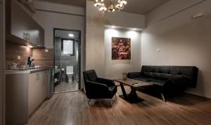 Kuchyň nebo kuchyňský kout v ubytování Pallada Athens boutique rooms & apartments