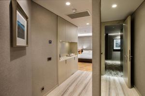 Cama ou camas em um quarto em Fer Hotel