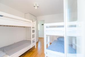 Postel nebo postele na pokoji v ubytování Ribar 1