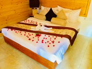 Voodi või voodid majutusasutuse Trinco Relax Hut toas