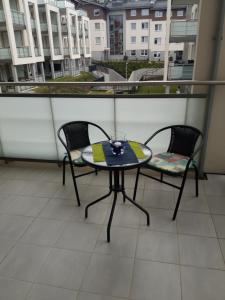 Balkón alebo terasa v ubytovaní Natura Apartament