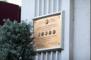 a sign on the side of a building at Sapphire Hotel in Baku