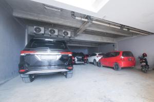 Fotografie z fotogalerie ubytování RedDoorz Plus near Green Pramuka Square Mall v destinaci Jakarta