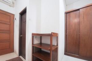 Fotografie z fotogalerie ubytování RedDoorz Plus near Green Pramuka Square Mall v destinaci Jakarta