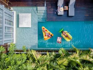 Ein Garten an der Unterkunft W Koh Samui