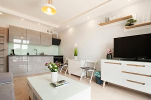 Kuchnia lub aneks kuchenny w obiekcie Apartament słoneczny