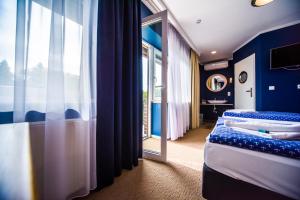 Postel nebo postele na pokoji v ubytování Hotel 4 + 37 fotografií