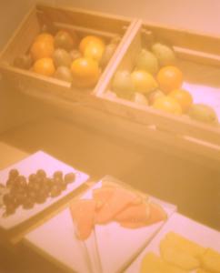 
a table topped with lots of different types of fruit at Pol & Grace Hotel in Barcelona
