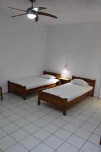Postel nebo postele na pokoji v ubytování Villa Angela