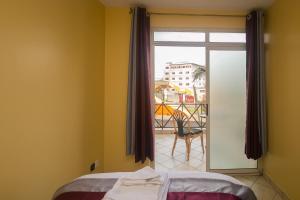 Postel nebo postele na pokoji v ubytování Plus254 Hotel + 37 fotografií