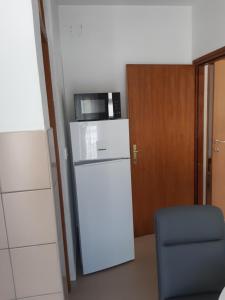 Kuchyň nebo kuchyňský kout v ubytování Apartmani Frano