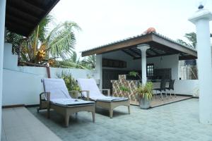 Patio nebo venkovní prostory v ubytování Villa Koggala