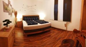 Postel nebo postele na pokoji v ubytování Landhaus List