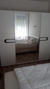 Postel nebo postele na pokoji v ubytování Lido riviera apartman