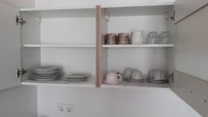Kuchyň nebo kuchyňský kout v ubytování Lido riviera apartman