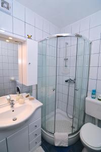 Koupelna v ubytování Apartman Duga + 23 fotografií