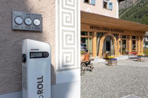 a gas meter in front of a building at Hotel Chesa Randolina in Sils Maria