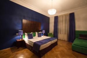 Postel nebo postele na pokoji v ubytování Appartement-Hotel an der Riemergasse + 37 fotografií