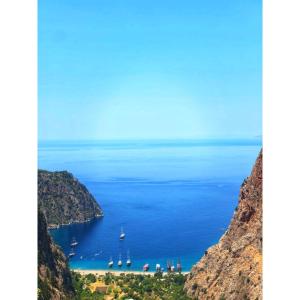 a view of a bay with boats in the water at İlkiz Beach Hotel in Oludeniz