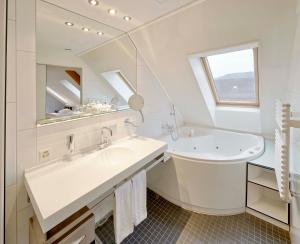 Baðherbergi á Boutique Hotel Seefeld