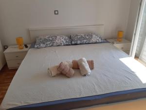 Postel nebo postele na pokoji v ubytování Apartmani Frano