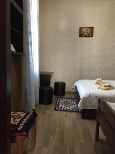 Postel nebo postele na pokoji v ubytování Guest House Loza