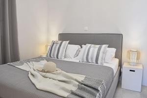Postel nebo postele na pokoji v ubytování Kastraki Dunes Naxos