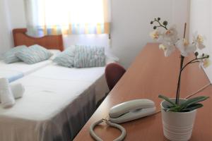Ein Bett oder Betten in einem Zimmer der Unterkunft Balcón del Romeral