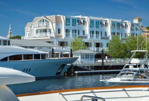 a boat docked in a marina next to a large building at Forty 1 North in Newport