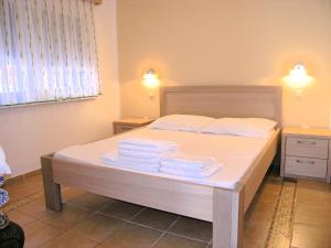 Un pat sau paturi într-o cameră la Apartment Damijan