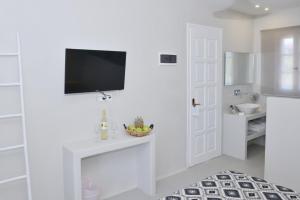 TV a/nebo společenská místnost v ubytování Kastraki Dunes Naxos
