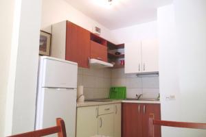 Kuchyň nebo kuchyňský kout v ubytování Apartments Delic