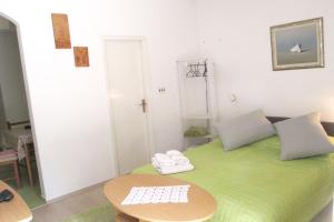 Postel nebo postele na pokoji v ubytování Apartments Delic