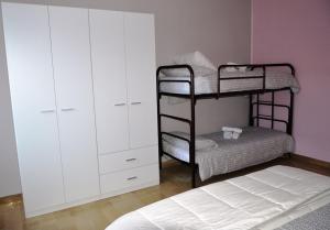 Двуетажно легло или двуетажни легла в стая в Casa Vacanze Garofoli