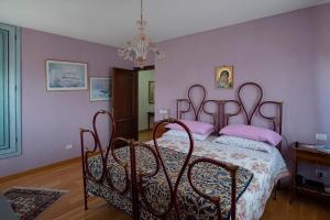 Postel nebo postele na pokoji v ubytování B&B Pino Cedro + 33 fotografií