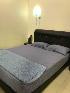 Giường trong phòng chung tại Family Homestay