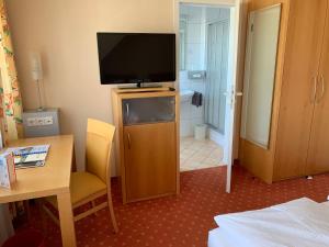 TV/trung tâm giải trí tại Hotel Möhringer Hof