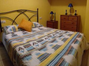 Łóżko lub łóżka w pokoju w obiekcie Casa San Miguel free WiFi