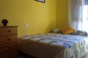 Łóżko lub łóżka w pokoju w obiekcie Casa San Miguel free WiFi