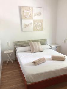 Un pat sau paturi într-o cameră la Vilasardemarlux2