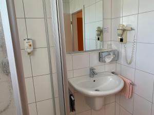 Phòng tắm tại Hotel Möhringer Hof