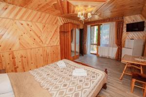 Letto o letti in una camera di Sadyba u Halyny