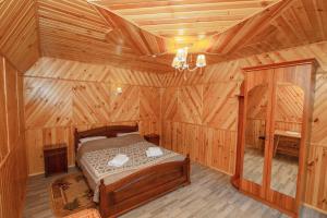 Letto o letti in una camera di Sadyba u Halyny
