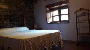 Postel nebo postele na pokoji v ubytování Casa rural Albina