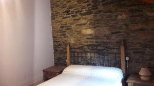 Postel nebo postele na pokoji v ubytování Casa rural Albina