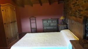 Postel nebo postele na pokoji v ubytování Casa rural Albina