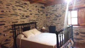 Postel nebo postele na pokoji v ubytování Casa rural Albina