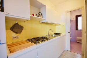 A cozinha ou cozinha compacta de Summer Residence Bunte