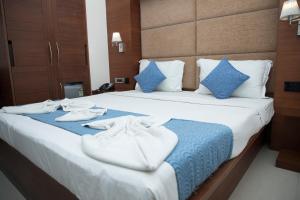 Postel nebo postele na pokoji v ubytování Moskva Hotel