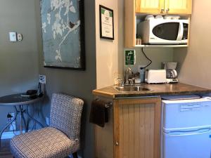 A kitchen or kitchenette at Bed and Breakfast Du Repos